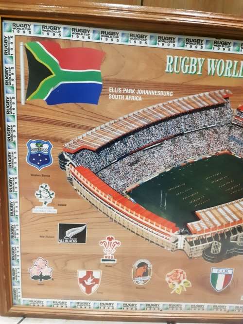 Big official Rugby World Cup final 1995 Ellis Park scene on wooden bord with glass