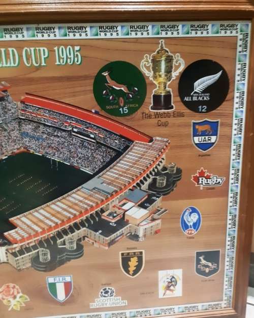 Big official Rugby World Cup final 1995 Ellis Park scene on wooden bord with glass