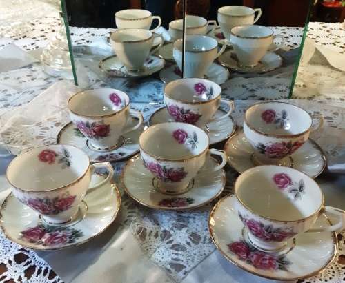 Beautiful 12 piece rose design with gold trimming vintage 12 piece LM tea set