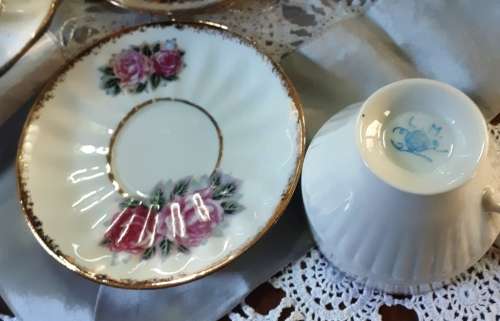 Beautiful 12 piece rose design with gold trimming vintage 12 piece LM tea set