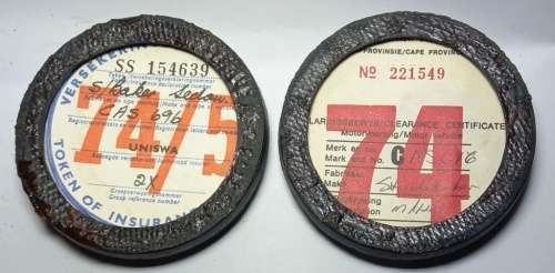 Classic chrome window car license disc holders from 70`s branded AC Spark Plugs and Delco Batteries