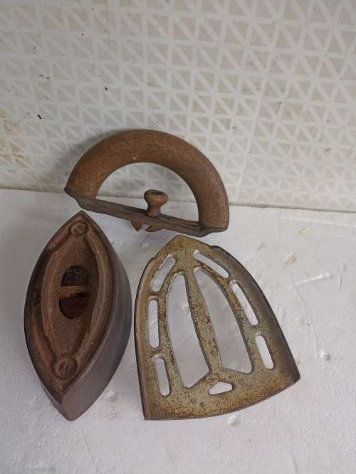 Vintage cast iron clip oniron with wooden hand for ironing of clothes & rest