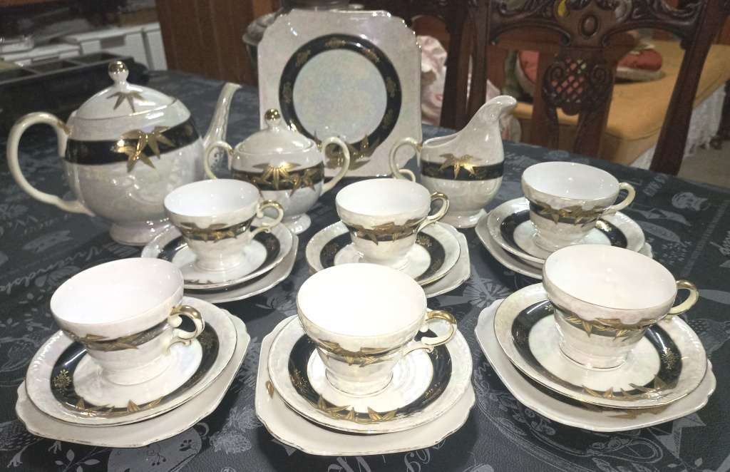 Beautiful Mother of Pearl, Gold Embossed 24 piece Joyale Fine China Hand Pained Patt.no 9153 Tea set