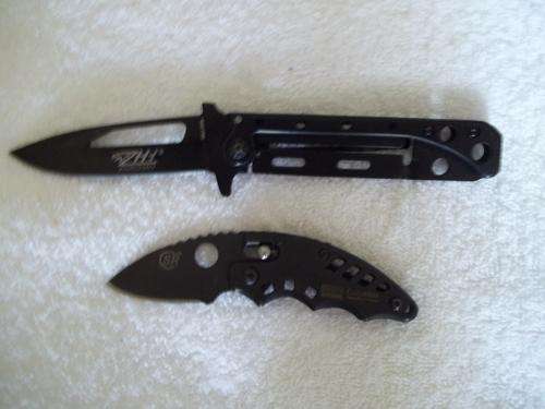 Columbia and ZHI 440 s,steel folding knifes (you bid for both)