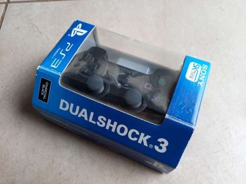 Playstation 3 console + game controllers + 6 games + HDMI cable