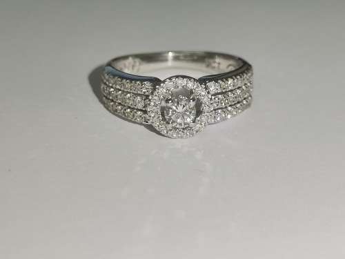 Magnificent White-Gold Halo Diamond Ring
