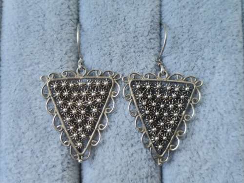 **R1 Auction**  Unique Silver Earrings