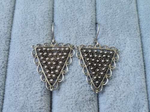 **R1 Auction**  Unique Silver Earrings