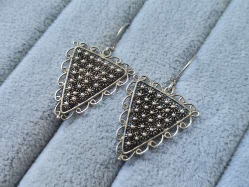 **R1 Auction**  Unique Silver Earrings