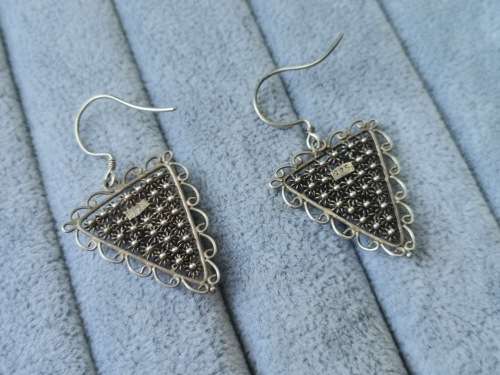 **R1 Auction**  Unique Silver Earrings