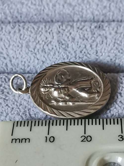 **R1 Auction**  Silver St Christopher Pendant