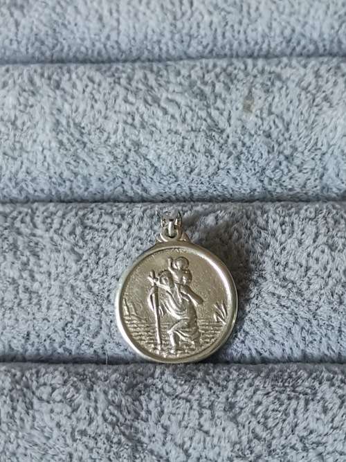 **R1 Auction** Silver St. Christopher Pendant