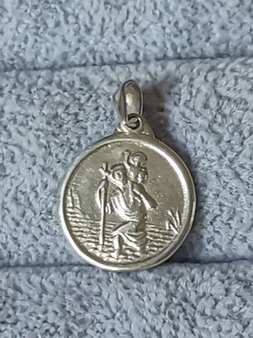 **R1 Auction** Silver St. Christopher Pendant