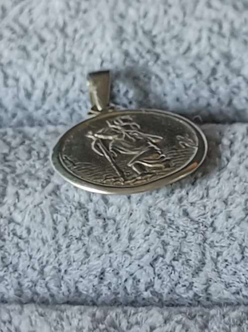 **R1 Auction** Silver St. Christopher Pendant