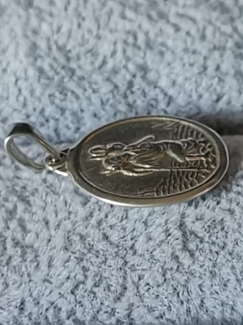 **R1 Auction** Silver St. Christopher Pendant