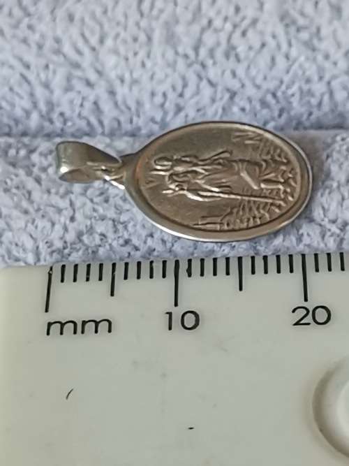 **R1 Auction** Silver St. Christopher Pendant
