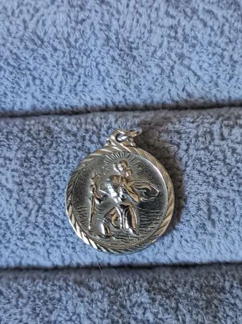 **R1 Auction**  Silver St. Christopher Pendant