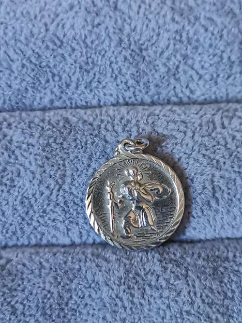 **R1 Auction**  Silver St. Christopher Pendant