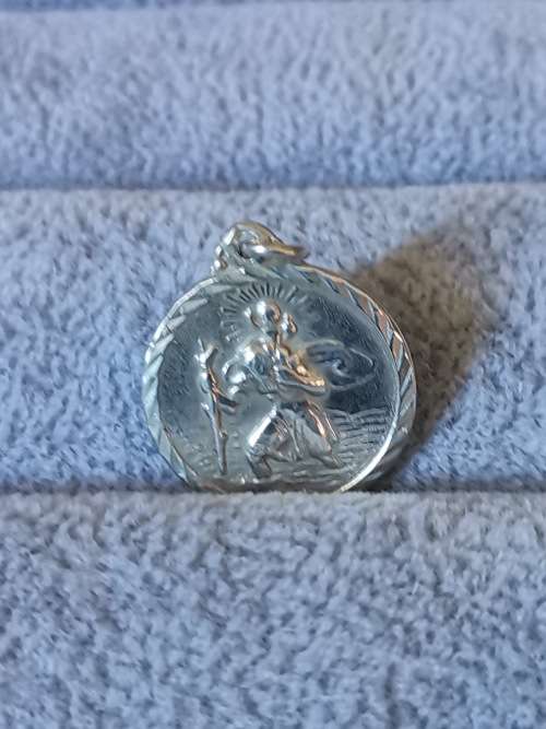 **R1 Auction**  Silver St. Christopher Pendant
