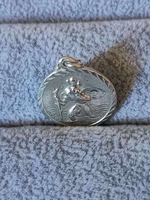 **R1 Auction**  Silver St. Christopher Pendant