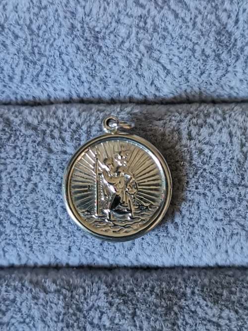 **R1 Auction**  Silver St. Christopher Pendant