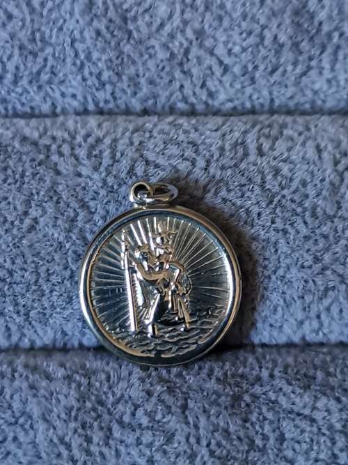 **R1 Auction**  Silver St. Christopher Pendant