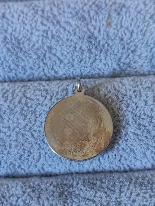 **R1 Auction**  Silver St. Christopher Pendant