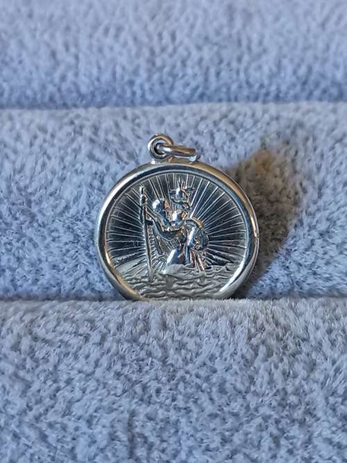 **R1 Auction**  Silver St. Christopher Pendant