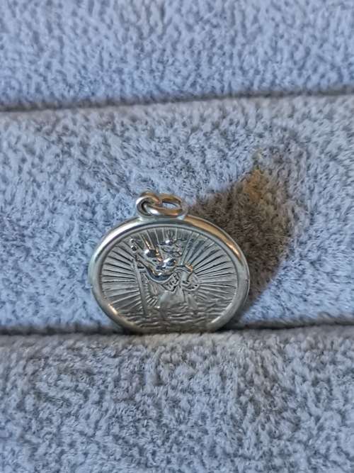 **R1 Auction**  Silver St. Christopher Pendant