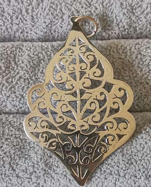 Detailed Silver Pendant