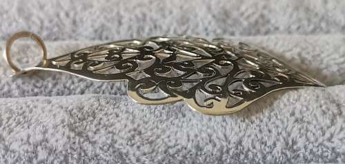 Detailed Silver Pendant