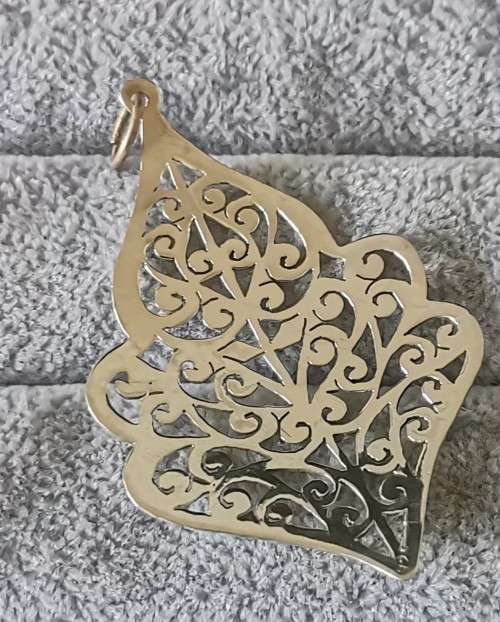 Detailed Silver Pendant