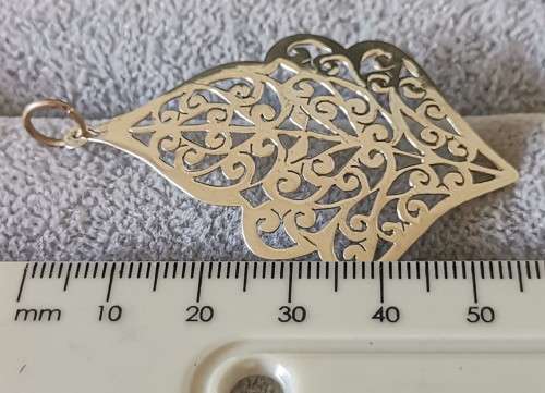 Detailed Silver Pendant