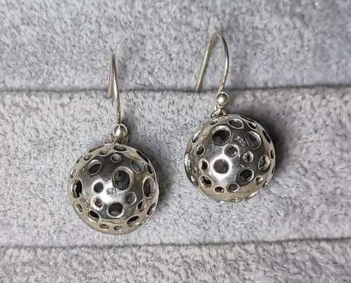 **R1 Auction**  Unique Silver Earrings