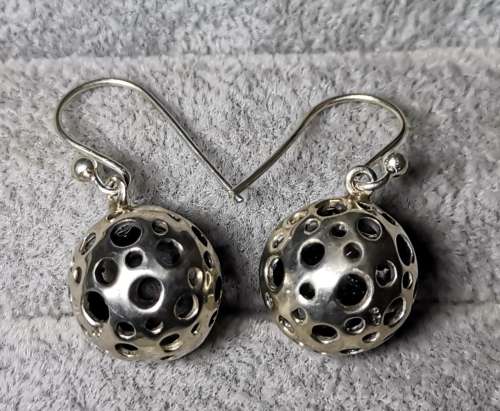 **R1 Auction**  Unique Silver Earrings