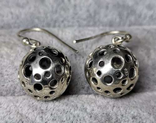 **R1 Auction**  Unique Silver Earrings