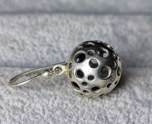 **R1 Auction**  Unique Silver Earrings