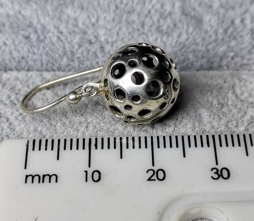 **R1 Auction**  Unique Silver Earrings