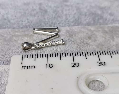 *R1 Auction* Silver `M` Pendant