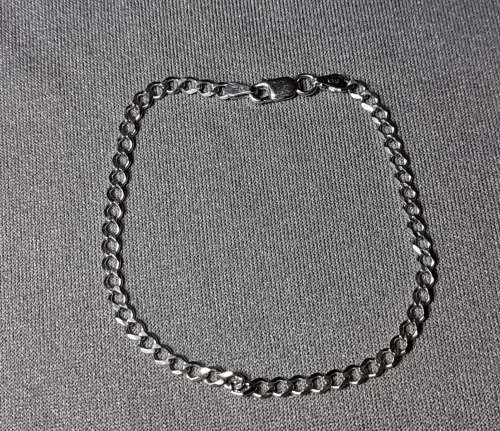 **R1 Auction**  Silver Curb Bracelet