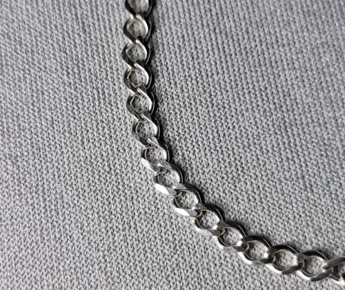 **R1 Auction**  Silver Curb Bracelet