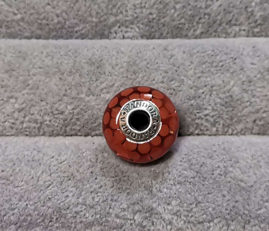**R1 Auction**  Pandora Large Burnt Orange Dots Glass Charm