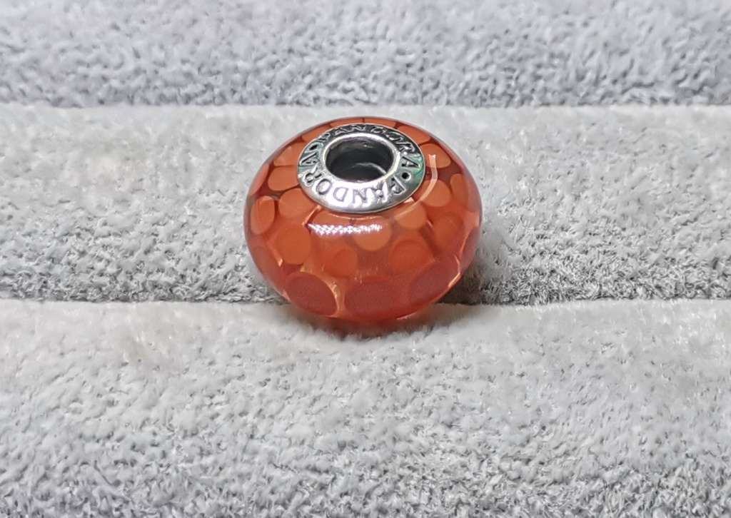 **R1 Auction**  Pandora Large Burnt Orange Dots Glass Charm