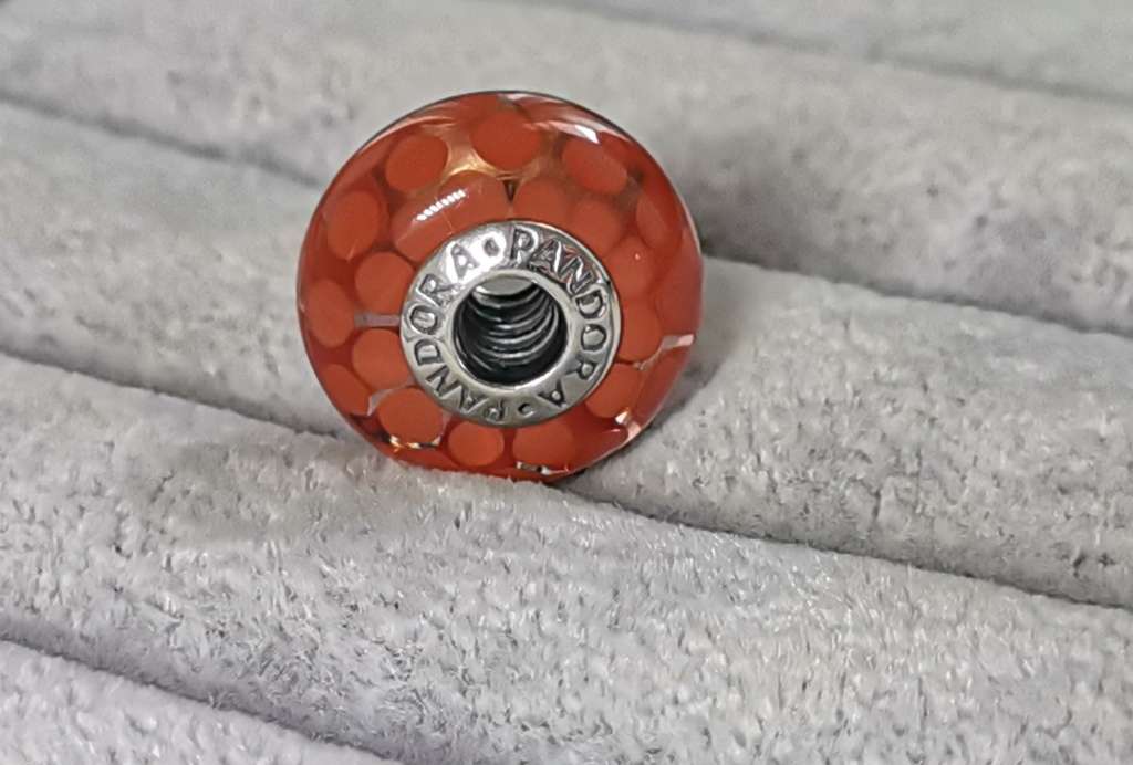 **R1 Auction**  Pandora Large Burnt Orange Dots Glass Charm