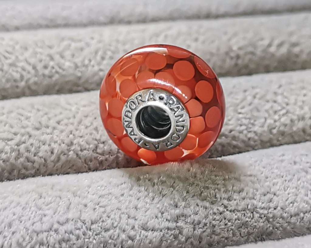 **R1 Auction**  Pandora Large Burnt Orange Dots Glass Charm