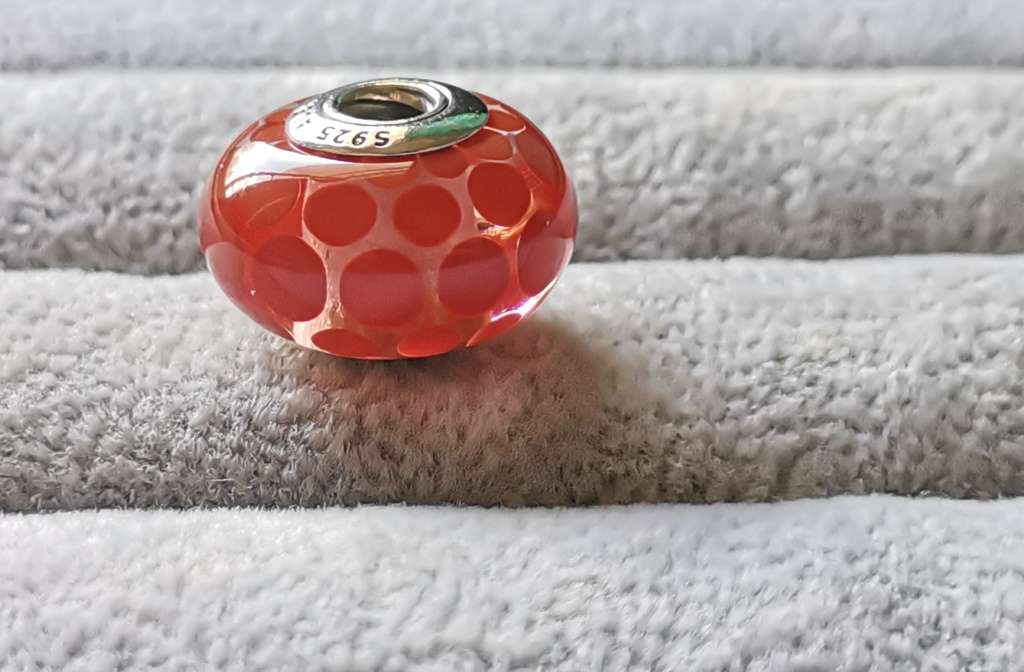 **R1 Auction**  Pandora Large Burnt Orange Dots Glass Charm