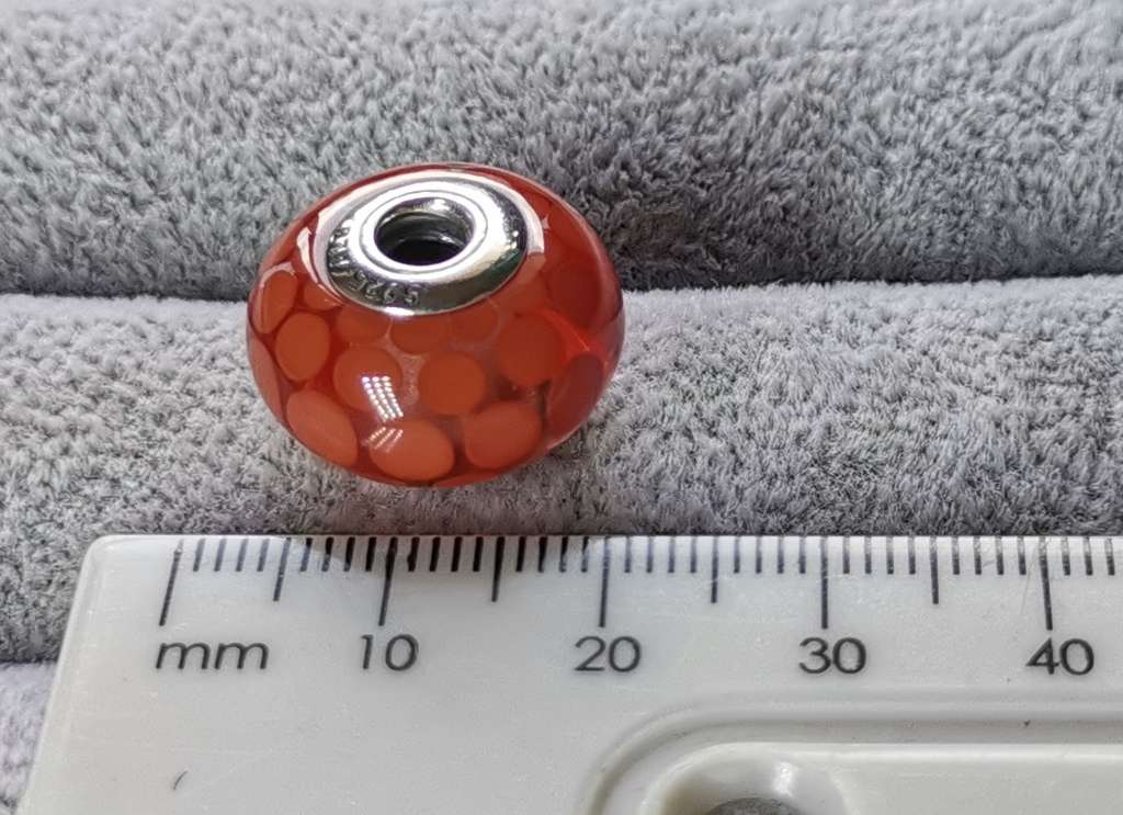 **R1 Auction**  Pandora Large Burnt Orange Dots Glass Charm