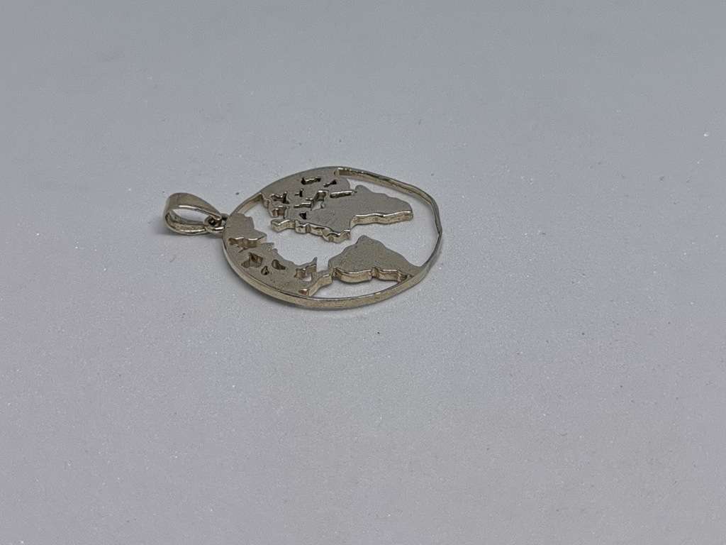Silver Earth Pendant