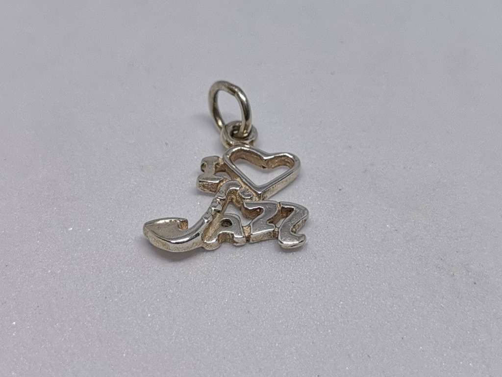 *R1 Auction* Silver Jazz Charm