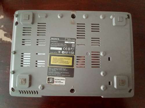 Old PS1 console with cables and 2 games(not tested)